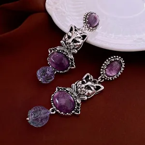 Vintage silver cat drop earrings featuring purple oval gemstone and lavender pearl beads