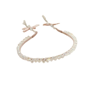 Elegant crystal bead headband for women with light pink ribbons and shimmering glass beads