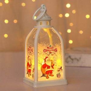 White Christmas lantern with Santa Claus illustration and warm LED light for holiday decor