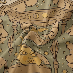 Detail of vintage bohemian tapestry featuring moon face architecture and starry clouds