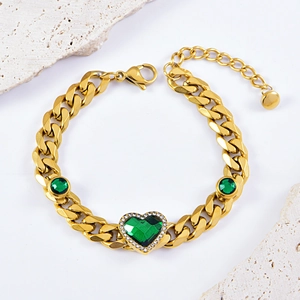 Gold Cuban link bracelet with heart-shaped green gemstone and rhinestone accents