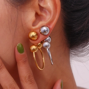 Minimalist gold and silver stainless steel hoop earrings with triple ball accents