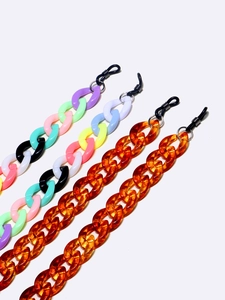 Macro shot of colorful acrylic eyeglass chains with rubber loops and tortoiseshell links