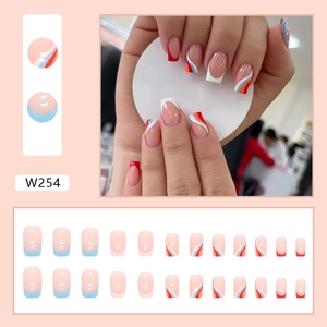 French wave pattern press-on nails in blue and red with abstract design, 24 piece set