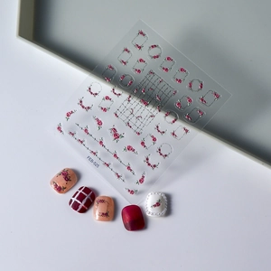 Detailed FEB-525 nail stickers featuring 3D red roses and intricate floral lace designs