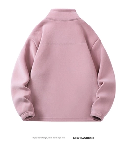 Rear view of a soft pink fleece jacket featuring a stand-up collar and elastic cuffs