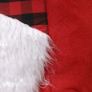 Detailed macro view of red velvet, buffalo plaid fabric and white faux fur textures