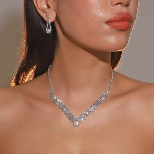Elegant bridal necklace and earring set with sparkling rhinestones in silver finish
