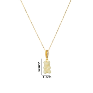 Gold chain necklace with a cream gummy bear pendant and zircon details, 2.0x1.2cm size