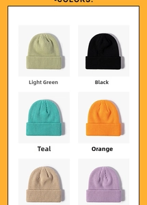 Close-up of ribbed knit beanies in multiple vibrant colors with fold-over cuffs