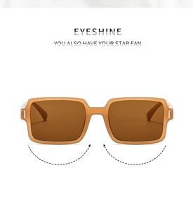 Detailed macro view of amber square frame sunglasses with metal hinge rivet accents