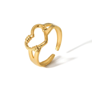 Minimalist adjustable gold heart ring with intertwined double line design on white background