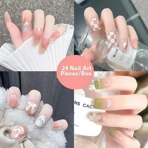 Detailed view of four nail art styles including cat-eye and floral 24pcs box set