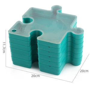 Detail view of 8-layer teal modular puzzle storage boxes showing 20x20cm dimensions