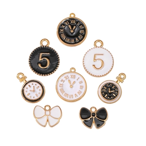 Detailed close-up of 8-piece clock and bow alloy charms set for jewelry making