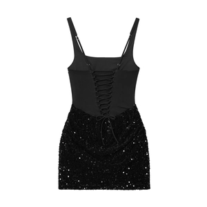 Close-up of black sequin dress featuring adjustable crisscross lace-up back detail