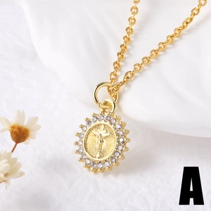 Gold-plated religious medallion necklace with crystal halo and elegant crucifix relief