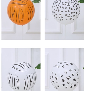 Detailed grid view showing tiger, leopard, zebra and paw prints on 12-inch party balloons