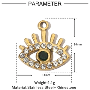 Macro shot of 14mm gold stainless steel evil eye heart charm with crystals and green stone