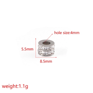 Detail showing an 8.5mm silver cylinder bead with two rows of crystals and a 4mm hole