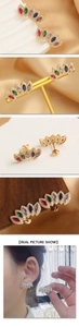 Detailed close-up of 18k gold plated crown earrings with colorful marquise zircons