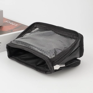 Vertical makeup brush bag in black with transparent window and zipper closure