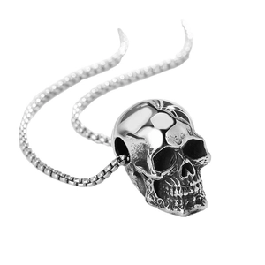 Polished titanium steel hip-hop skull pendant necklace for men on a white background