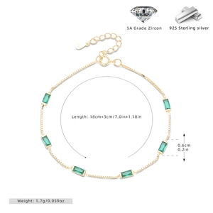 Detail of 925 sterling silver gold bracelet with green zircons and size specifications