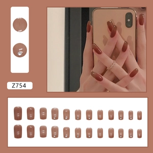 Minimalist caramel brown square press-on nails with tiny rhinestones and glossy finish