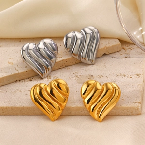 Boucles d'oreilles cœur en or 18 carats et argent avec finition texturée femme