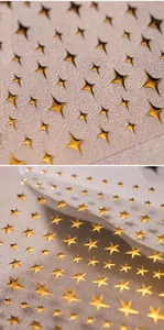 Detailed macro view of 3D metallic gold star nail stickers with reflective mirror finish