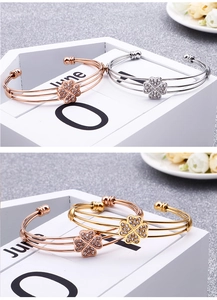 Bracciale a tre strati con quadrifoglio e zirconi incastonati in oro rosa e argento