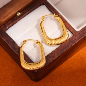 Minimalist golden rectangular stainless steel hoop earrings with textured vertical stripes