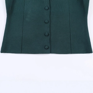 Forest green knit cardigan featuring matching fabric buttons and a slim ribbed texture