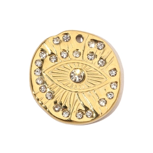 Detailed close-up of a gold-plated stainless steel evil eye pendant with crystal inlay