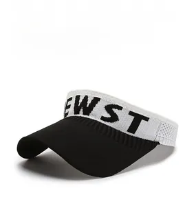 Detail of knitted sun visor with black and white contrast and NEW ST lettering