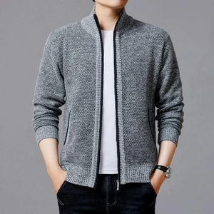 Close-up of gray men's knit cardigan showing fine texture and stand collar zipper detail