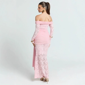 Detail of pink off-shoulder dress featuring pleated bodice and intricate lace back