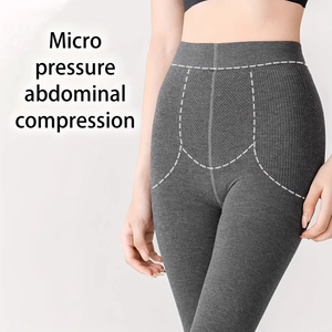 Detail of grey ribbed leggings with micro pressure abdominal compression design