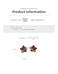 Detail view of cat star earrings with 1.7cm size dimensions and 5.6g weight specs
