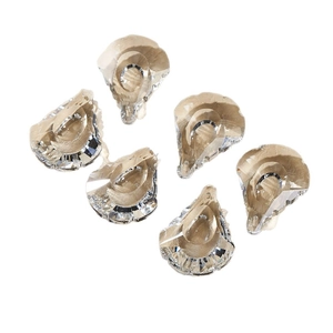 Set of 6 faceted crystal suncatcher pendants in champagne tint on white background