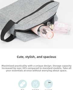 Grey Oxford fabric travel pouch showing 30 percent extra space for toiletries and makeup