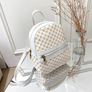 Mini white backpack with gold circular patterns and front pocket for women and students