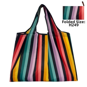 Detail view of foldable striped Oxford tote bag with compact folded storage demonstration