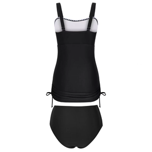 Detail of black tankini swim top with white lace trim and adjustable side drawstrings