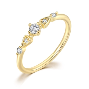 Detailed macro view of 14K gold plated zircon ring with elegant four-prong setting