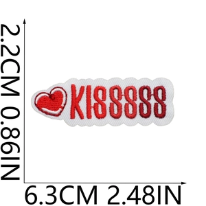 Size measurement of red heart embroidered patch with KISSSSS text on white background
