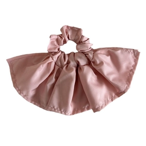 Elegant pink satin double-layered ruffle scrunchie with pleated skirt edge design