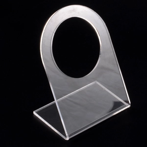 L-shaped clear acrylic display stand with circular hole for nose ring and lip stud piercing