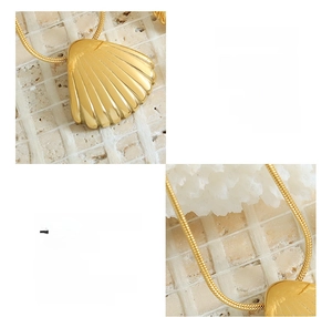 Macro detail of 18K gold plated seashell necklace and earrings with textured metal finish